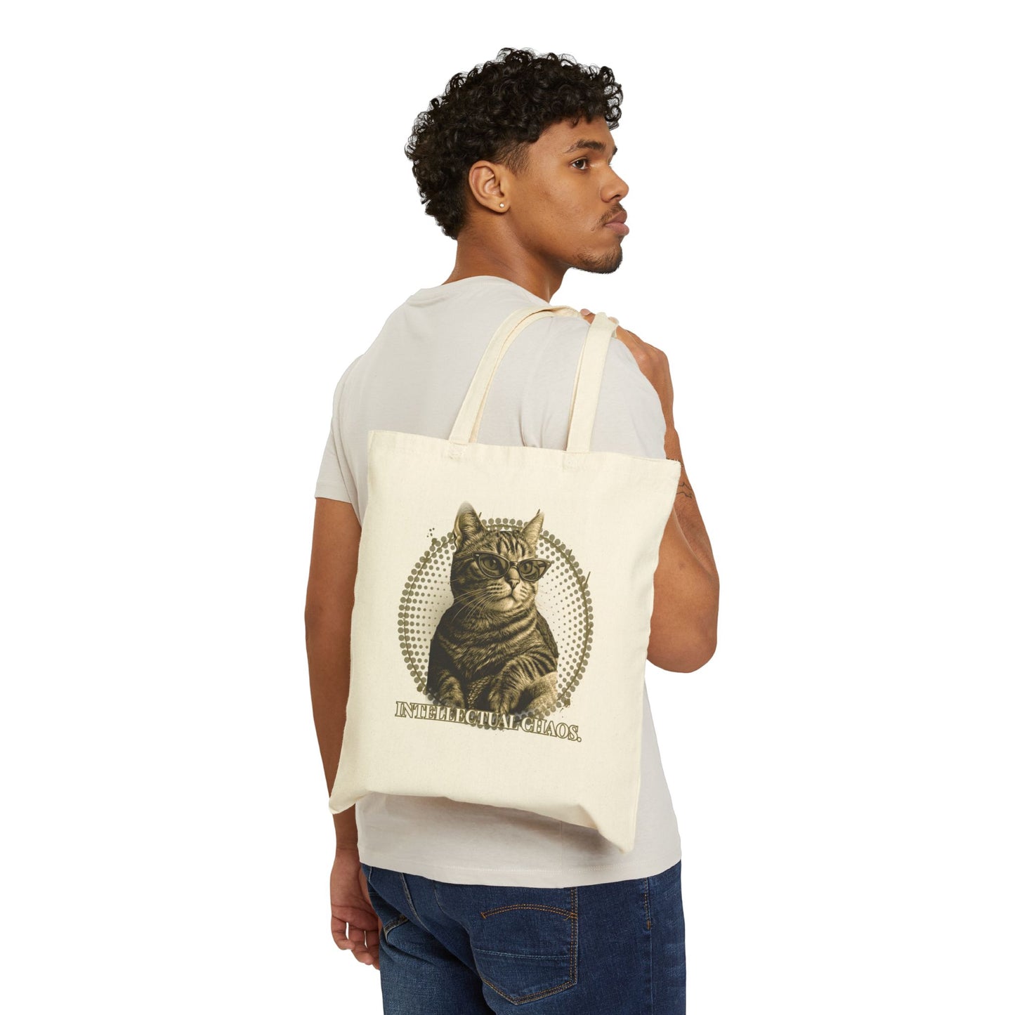 A natural colored cotton canvas tote bag featuring a vintage style graphic of a tabby cat wearing cat-eye glasses, with the text Intellectual Chaos.